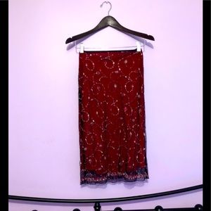 Mid length skirt with embroidery by harolds size 2